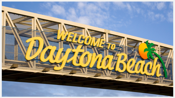 Photo of billboard saying Welcome to Daytona Beach