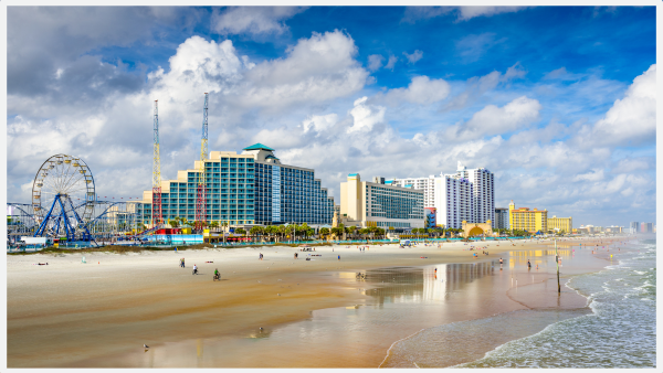 Photo of people hanging out by the ocean at Daytona Beach