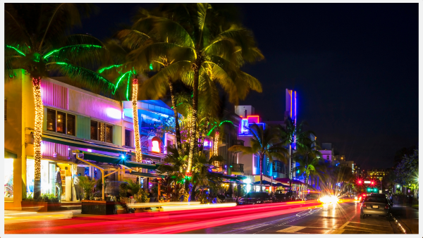 Photo with light trails of Miami strip at night