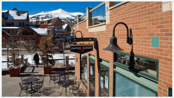 View of outdoor dining area of Empiure Burger