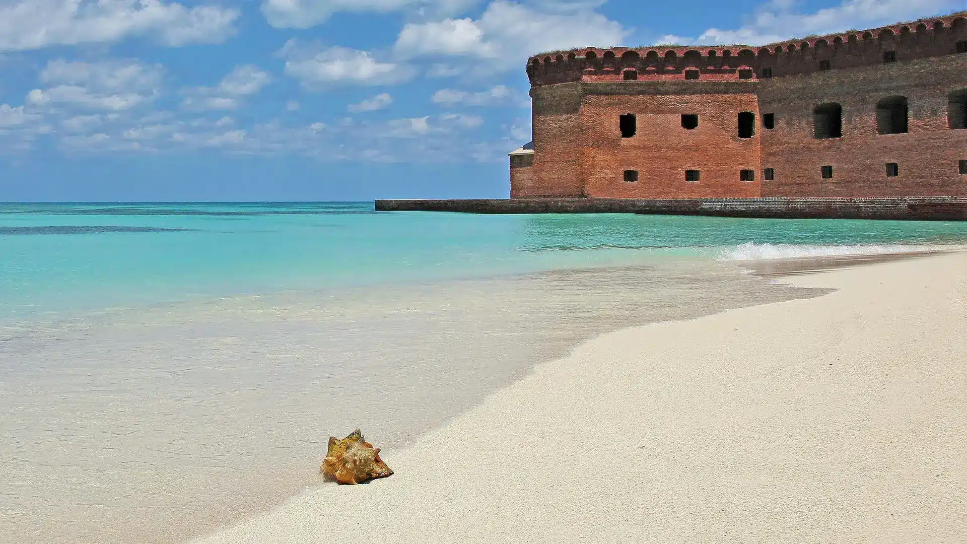 A sandy beach beside turquoise waters at Fort Jefferson
