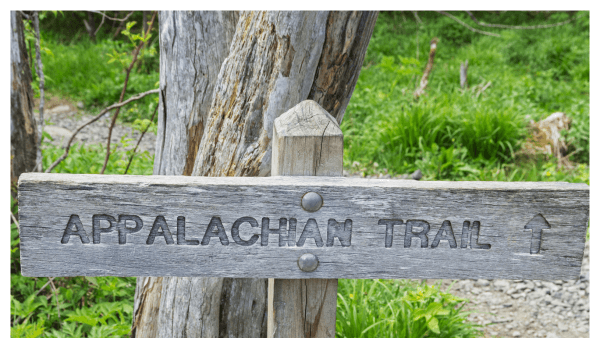 Image of wooden Applachian Trail sign along the trail