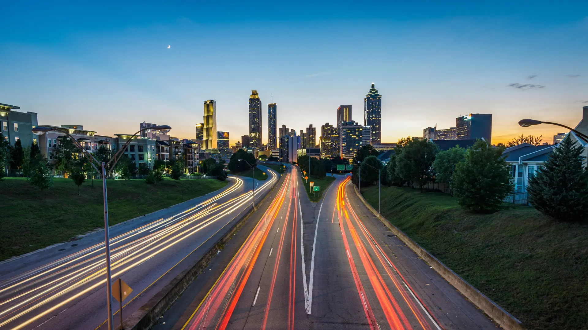 Night view of Atlanta's skyline with light trails