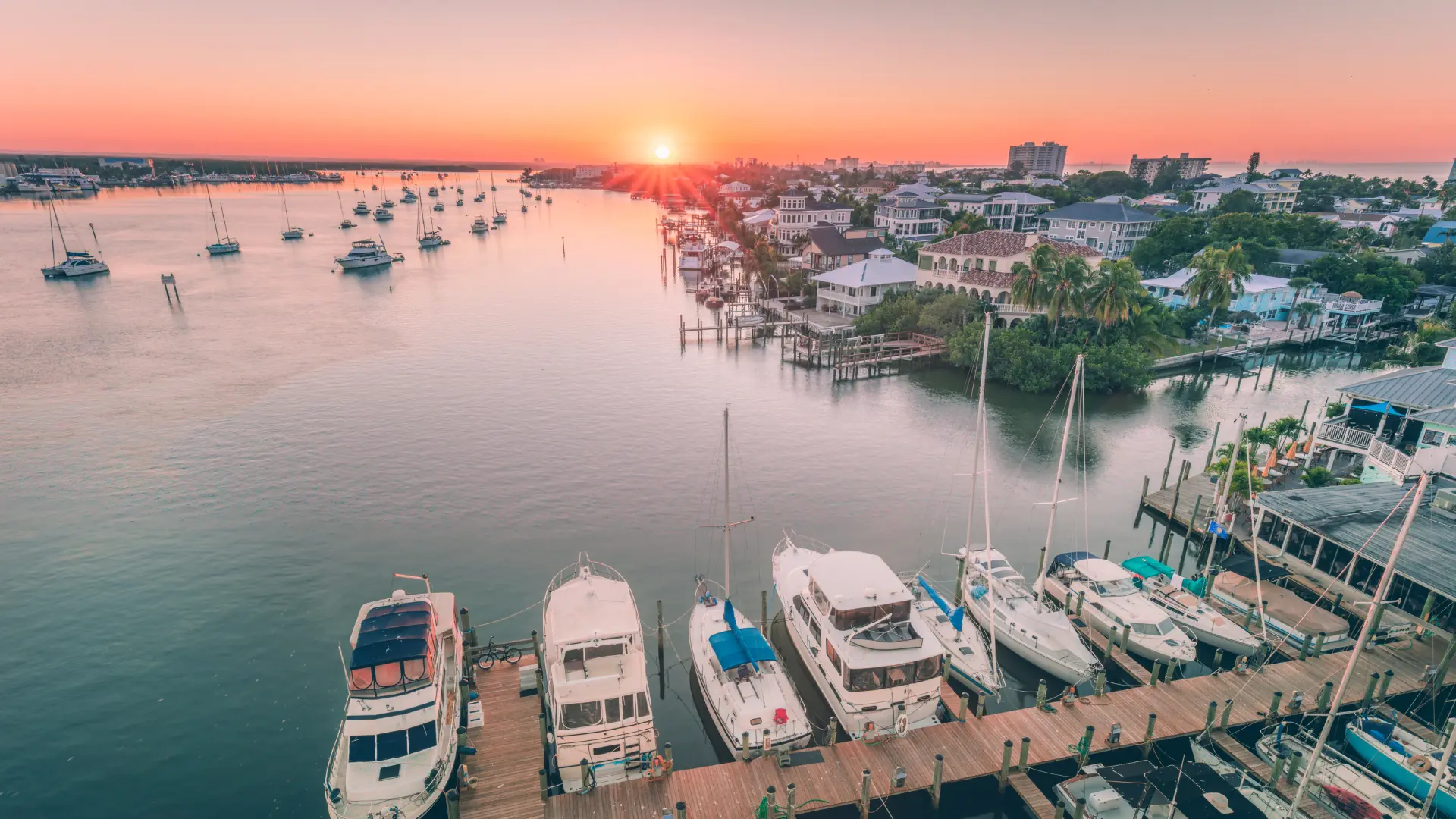 Aerial view of Fort Myers Beach sunset at a marina