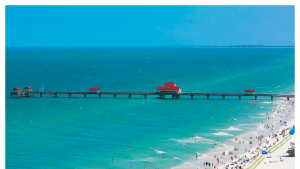 Aerial view of lots of people swimming at Clearwater Beach