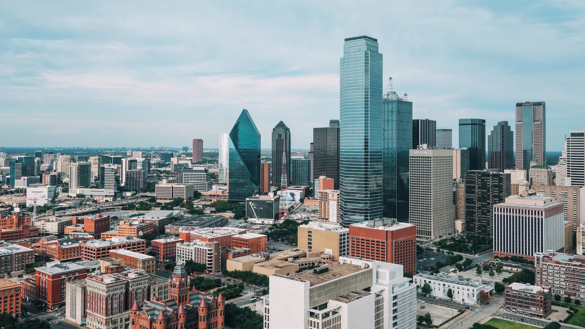 Aerial photo of Dallas and the cityscape on a cloudy day