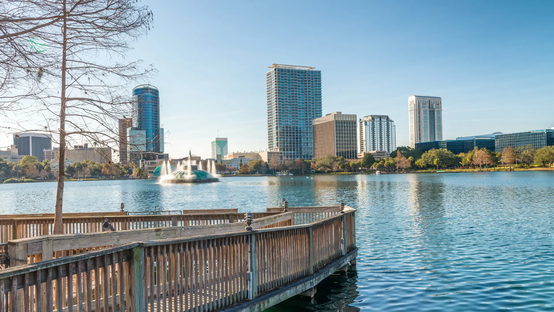 View of Lake Eola Park in Orlando with walking pier to the water