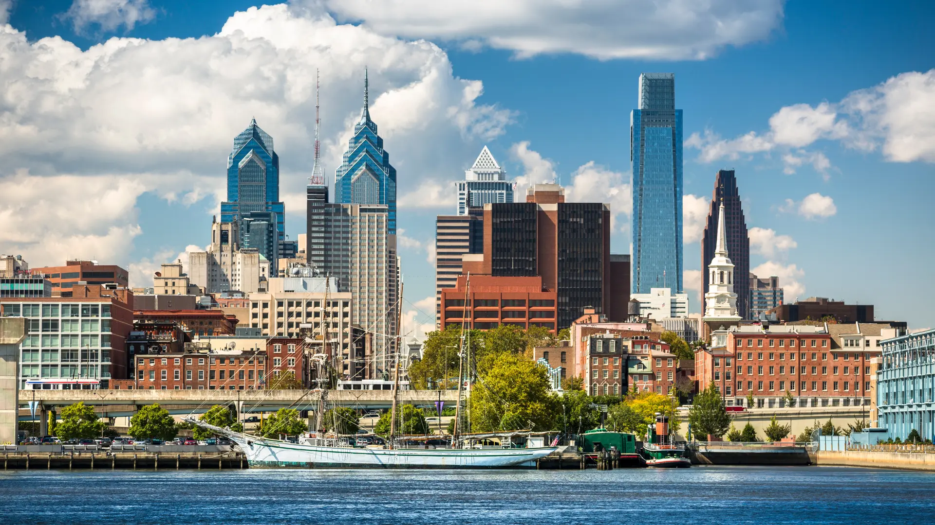 View of large sail boat docked on the Delaware River in Philly