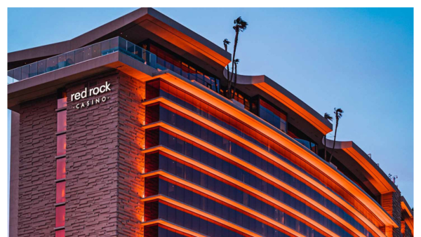 View of the illuminated Red Rock Casino and Resort building