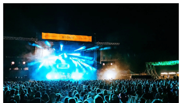 View of a concert at night with a big crowd at High Water Festival