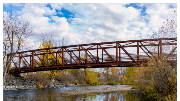 View of the Greenbelt footbridge going across the Boise river