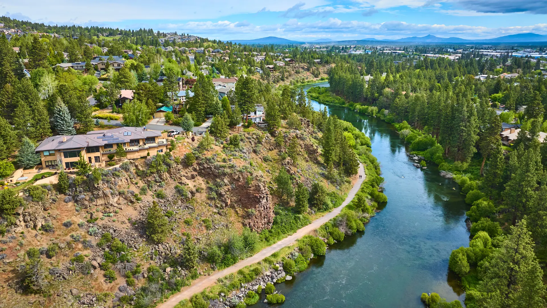 Aerial view of luxury homes in Bend, Oregon by a river