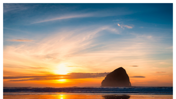 View of a big sunset in Pacific City, oregon by the coast