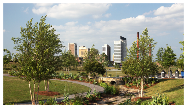 View of a park with plants and trees near downtown Birmingham, AL