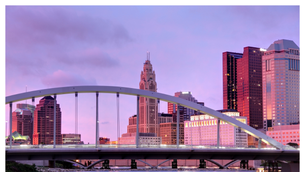 View of the Columbus Ohio sunset by the bridge and skyline