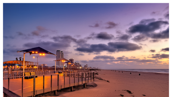 View of the boardwalk at sunset in South Padre Island