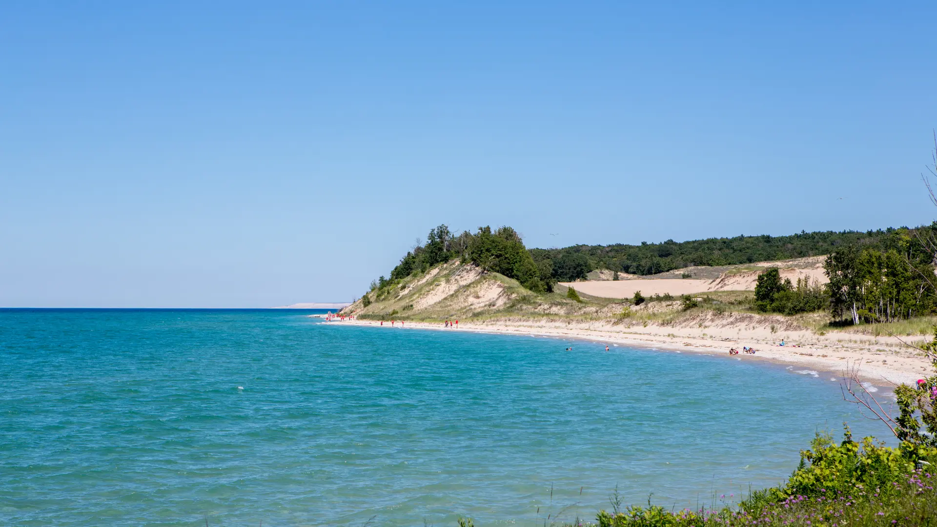 View of people swimming and relaxing on Lake Michigan beaches