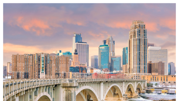 View of the Minneapolis skyline during sunset with tall buildings