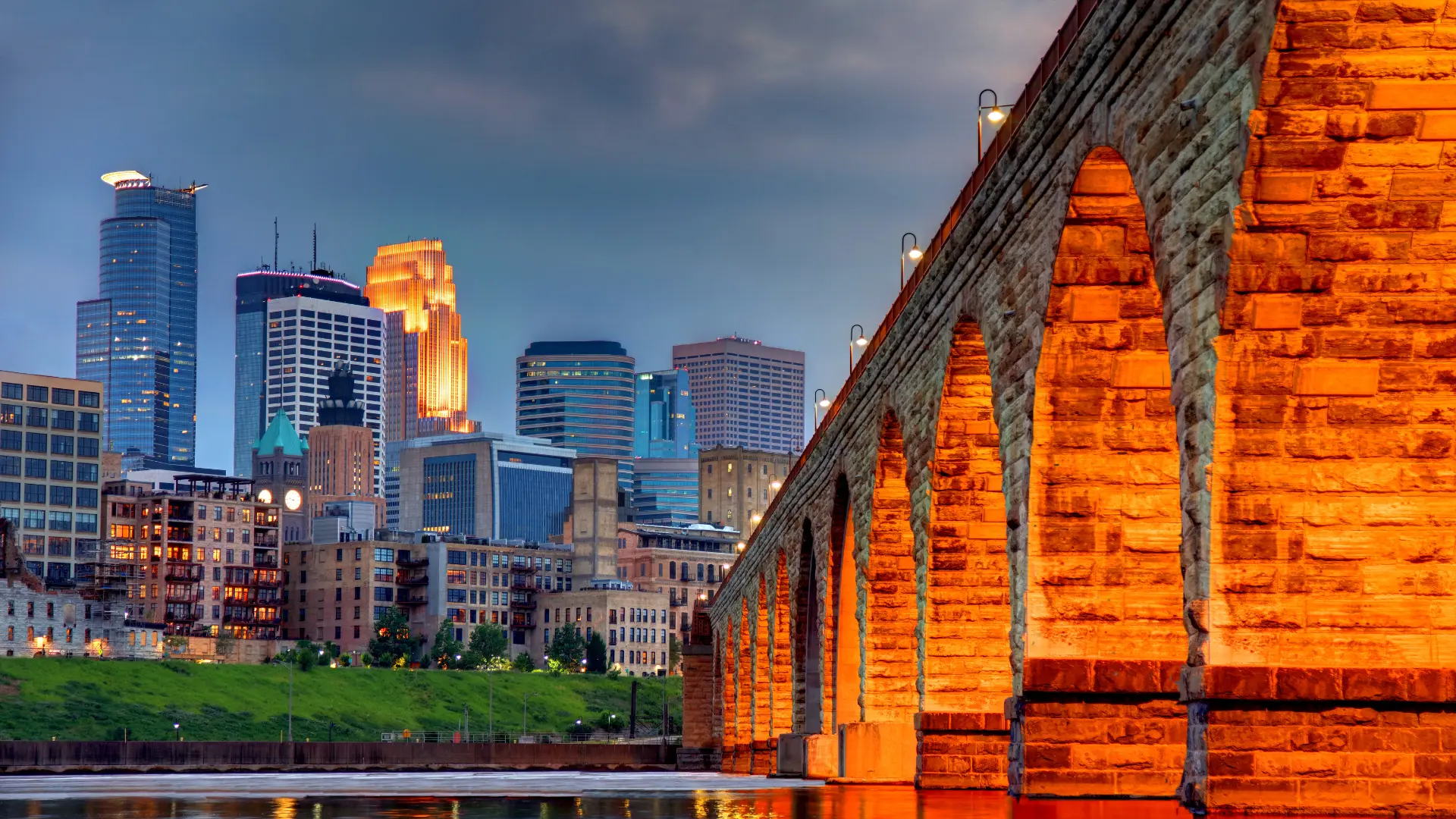 View of the downtown Minneapolis skyline by a bridge